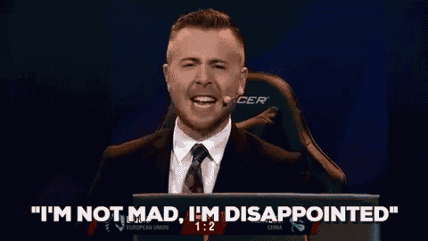 a man in a suit and tie says " i 'm not mad i 'm disappointed " in front of a laptop