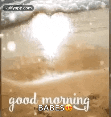 a good morning greeting card with a heart in the ocean