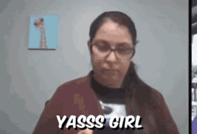 a woman wearing glasses says yasss girl