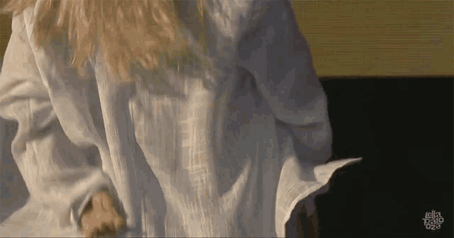 a close up of a woman 's torso with the word hello written on the bottom