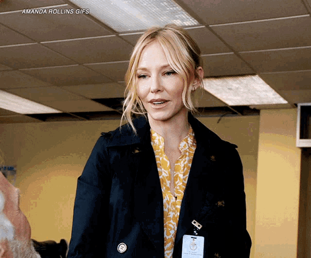 a woman with a name tag that says amanda rollins