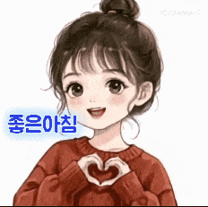 a girl is making a heart shape with her hands