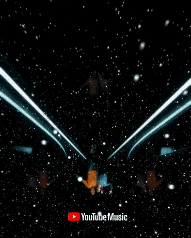 a man singing into a microphone with the youtube music logo in the background