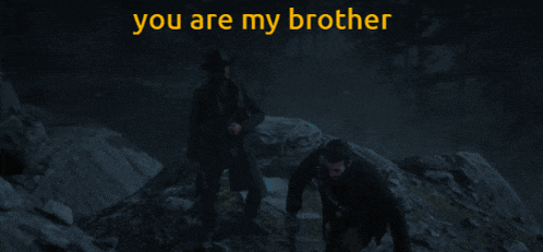 two men standing on a rock with the words " you are my brother " on top