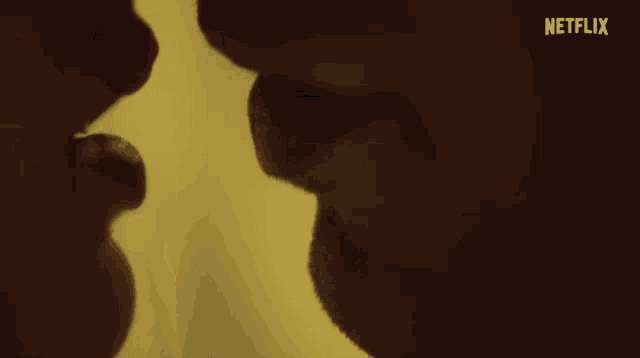 a close up of a man and woman kissing with the netflix logo visible