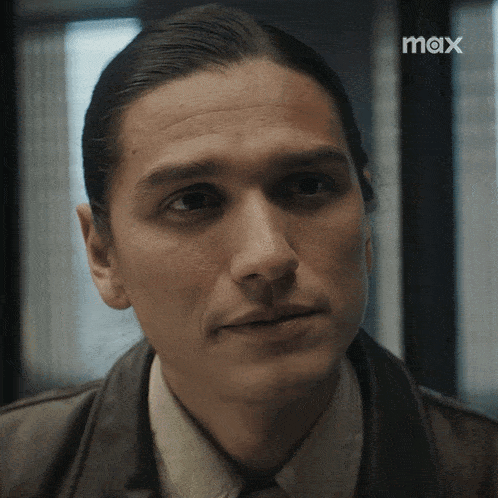 a close up of a man 's face with the word max on the bottom