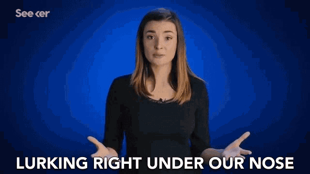 a woman is standing in front of a blue background with the words lurking right under our nose written on it