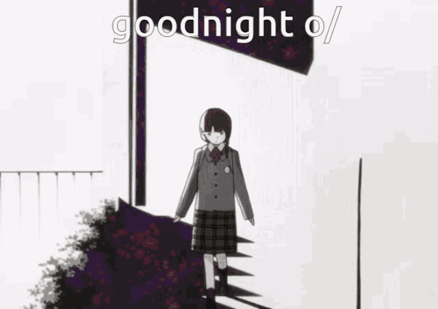 a girl is standing in front of a door with the words goodnight written on it