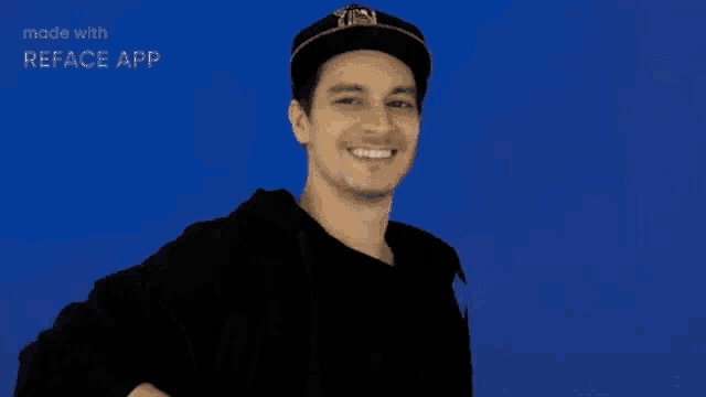 a man wearing a black shirt has a pixelated middle finger on his chest