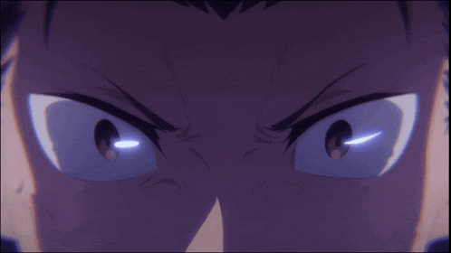 a close up of a person 's eyes with a light shining through them