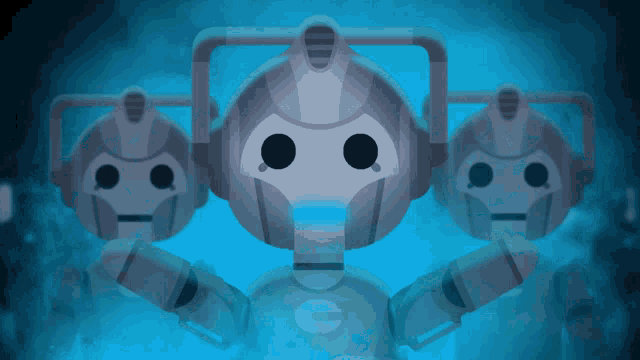 three robots are standing next to each other with the letter g on their chests