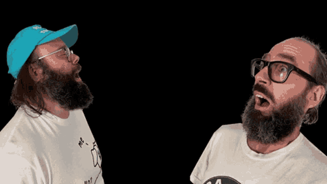 a man with a beard and glasses is wearing a white shirt that says r.i.p.