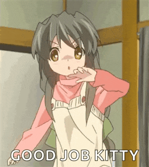 a girl in an apron is saying `` good job kitty '' while standing in front of a door .
