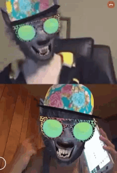 a person wearing a hat and sunglasses talking on a cell phone