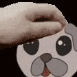 a person is petting a cartoon dog 's face with their hand .