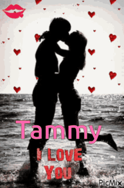 a picture of a man and woman kissing with tammy i love you written in pink