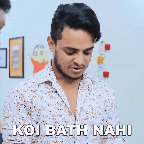 a man in a floral shirt is making a funny face and saying koi bath nahi
