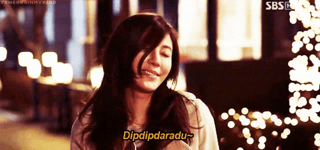 a woman says " dipdipdarado " in front of a sbs logo