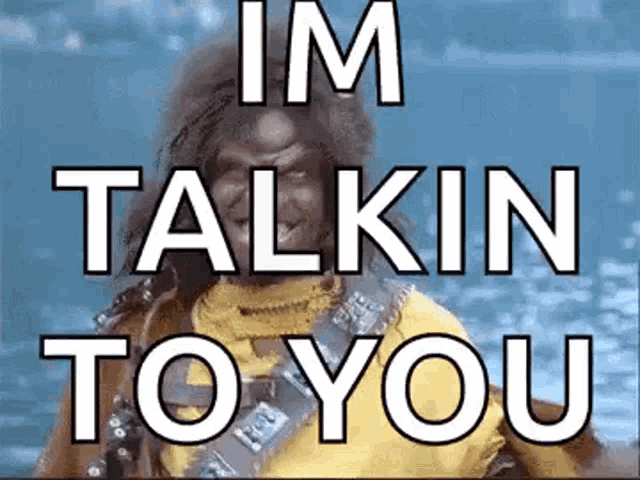 a picture of a man with the words `` im talkin to you '' on it .
