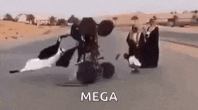 a group of people are riding a motorcycle on a road in the desert .