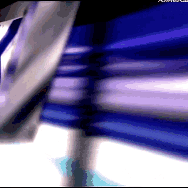a computer screen shows a purple and white background with the words " the next thing " on the bottom right