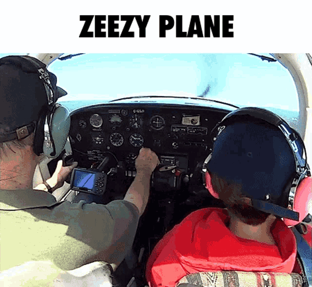 a man is driving a plane with the words " zeezy plane " on the bottom