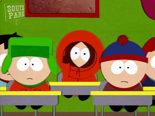 a group of south park characters are sitting at their desks