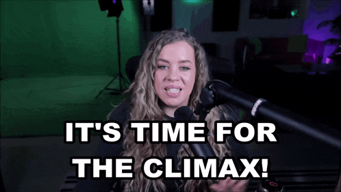 a woman is sitting in front of a microphone and saying it 's time for the climax !