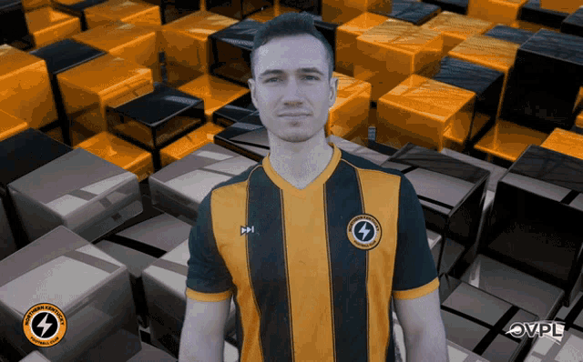 a man in a black and yellow striped shirt with a lightning bolt on the front