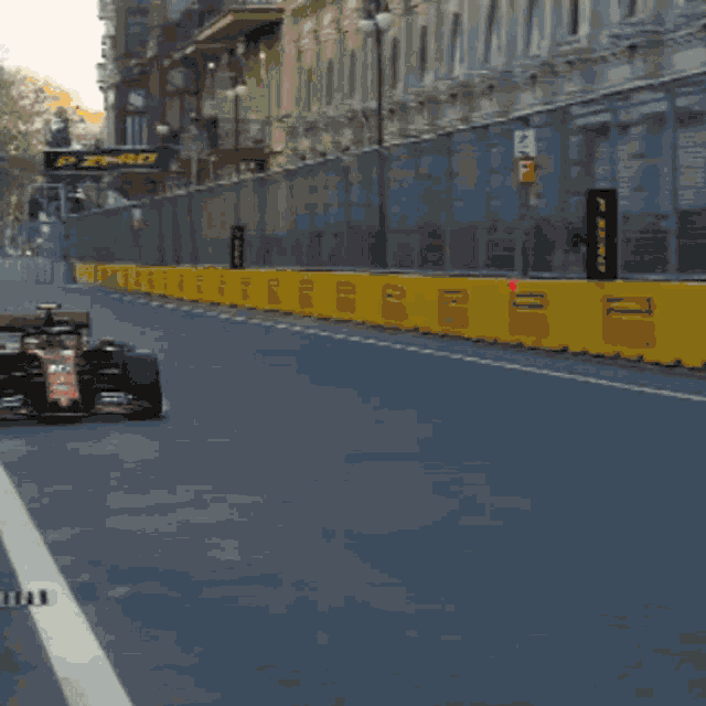 a pixelated image of a race car with the number 16 on it
