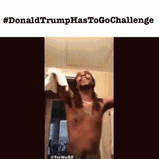 a man without a shirt is holding a towel in a bathroom with the hashtag #donald trumphastogo challenge