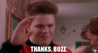 a man is saluting and saying `` thanks , buzz '' while another man looks on .
