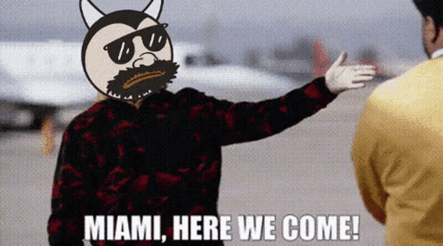 a man with a devil face on his head says miami here we come