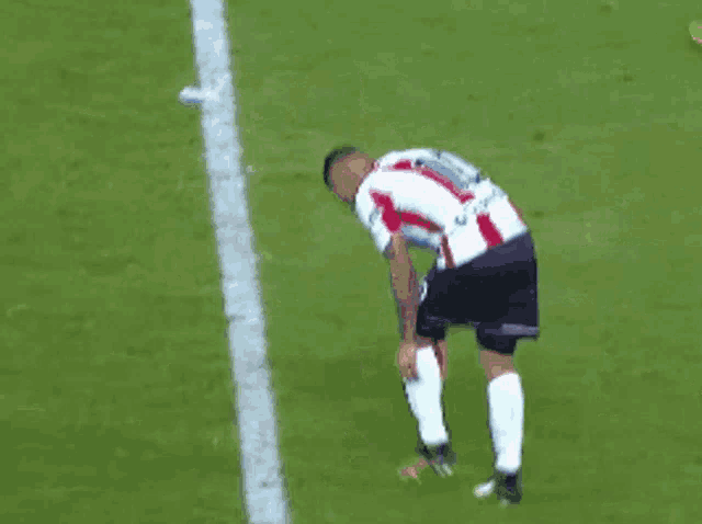a soccer game is being played in a stadium with the word tranquila written on the field
