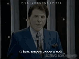 a man in a suit and tie says o bem sempre vence o mal !