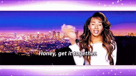 a woman says honey get it together in front of a city at night