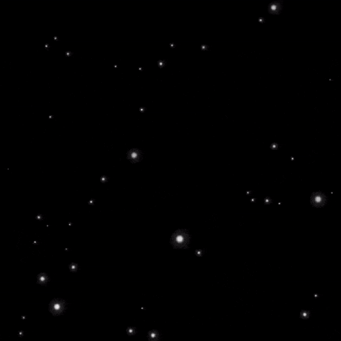 a bunch of white stars are flying in the night sky