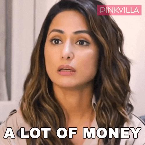 a woman says a lot of money in front of her face