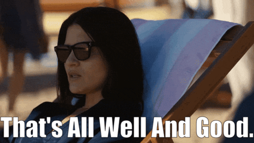 a woman wearing sunglasses sits in a beach chair with the words that 's all well and good written below her