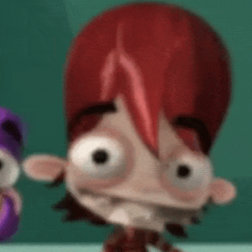 a blurry picture of a cartoon character with a red helmet on .