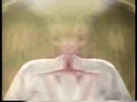 a close up of a person 's torso with a green background