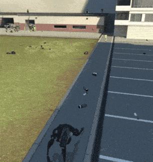 a video game scene where a robot is walking down a road