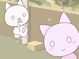 two cartoon cats are standing next to a cardboard box that says lii