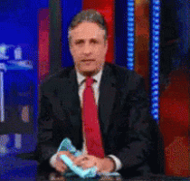 a man in a suit and tie says hijo de la chingada on a screen