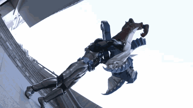 two robots are fighting each other and one has a sword in its hand