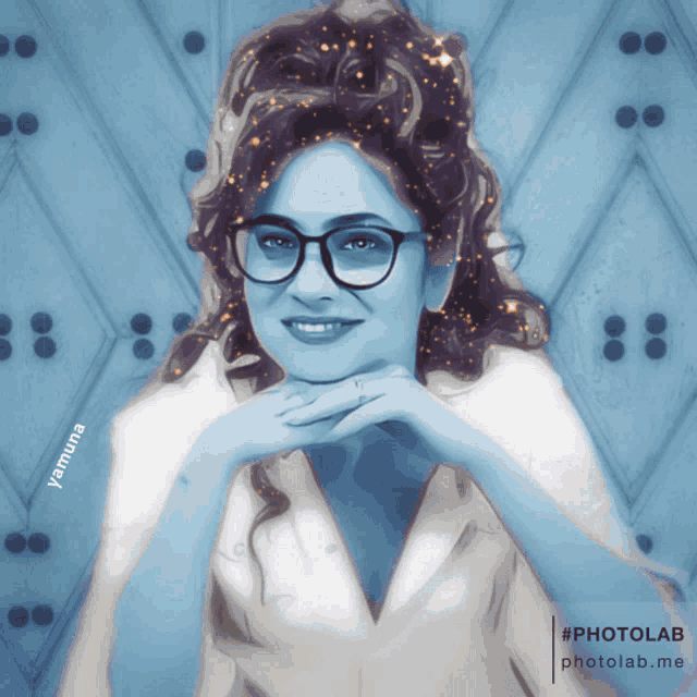 a painting of a woman with glasses and the name yamuna on the bottom