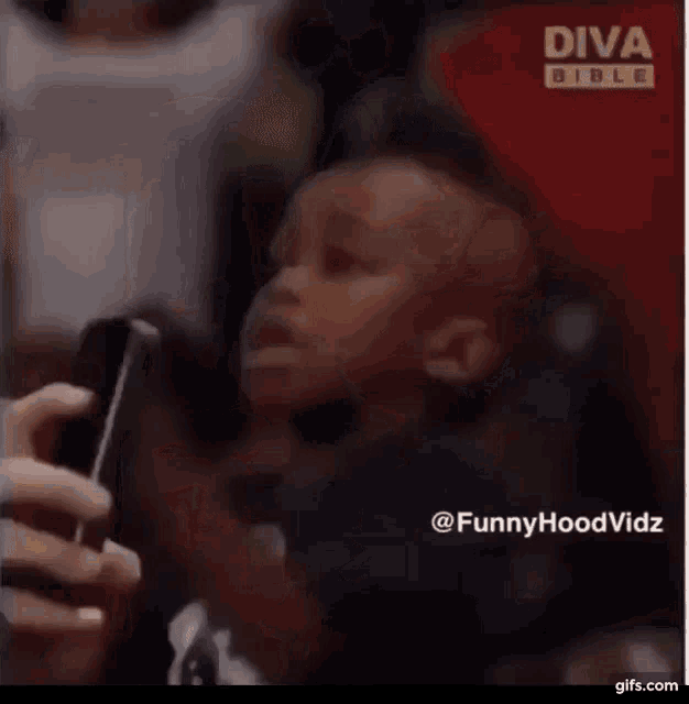 a person is taking a picture of another person with their phone .