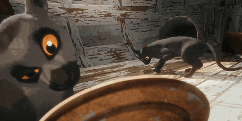 two cartoon cats are standing next to each other and looking at something
