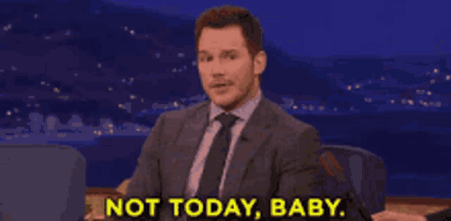 a man in a suit says not today baby