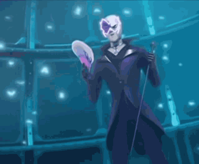 a man in a purple suit is holding a fan and a cane .